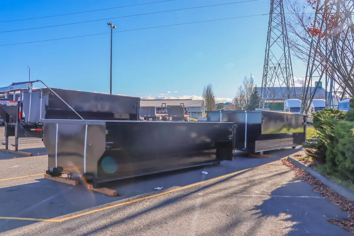 Roll-off dumpster ready for waste disposal at job site for 8 Yard Dumpster Rental in Offutt AFB